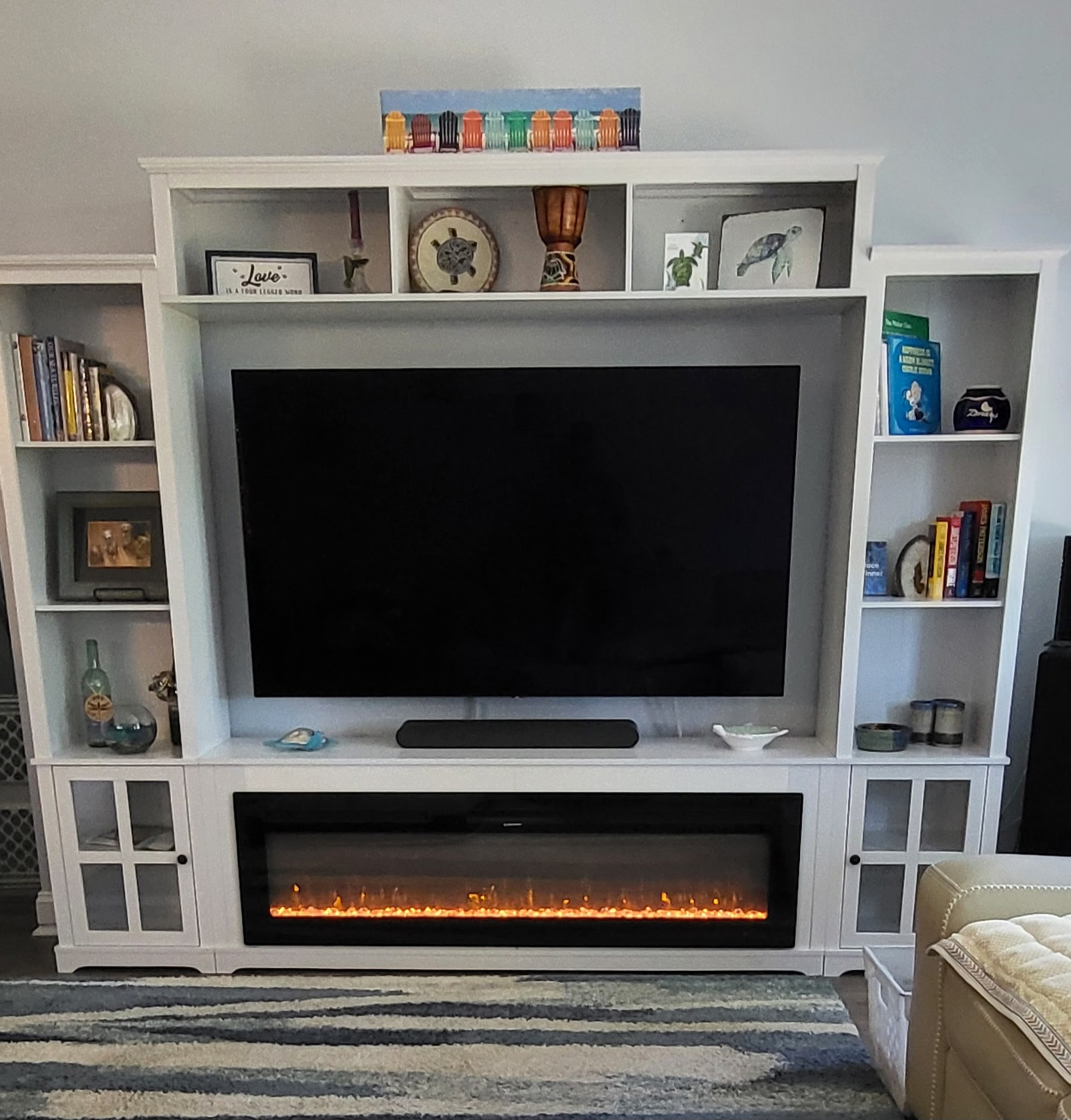 installed custom shelves and electric fireplace